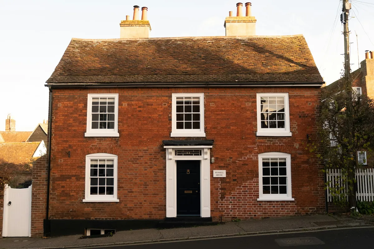Castle Gate Chambers: a Georgian brick townhouse with a black front door