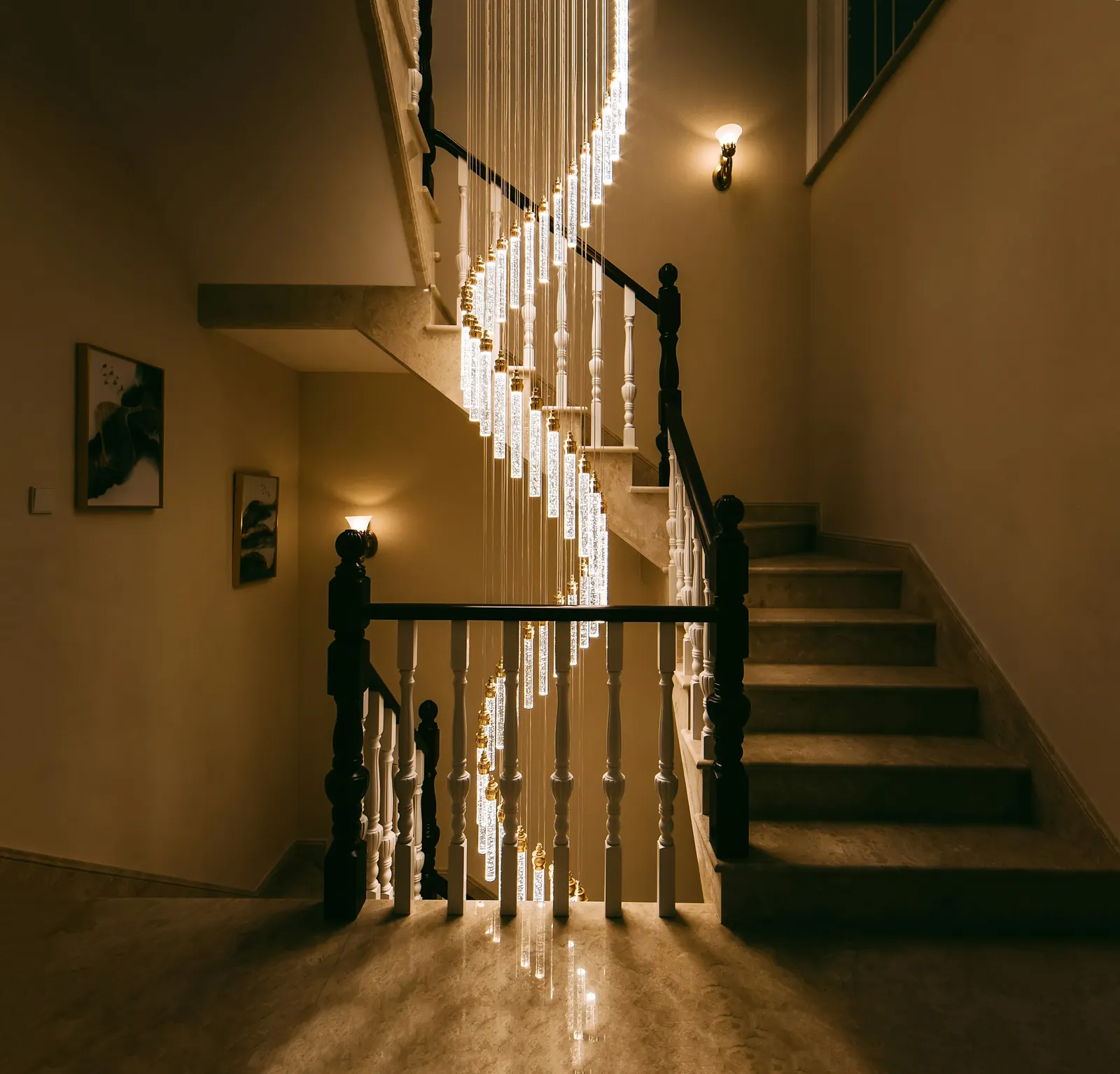 A period staircase turning in warm light