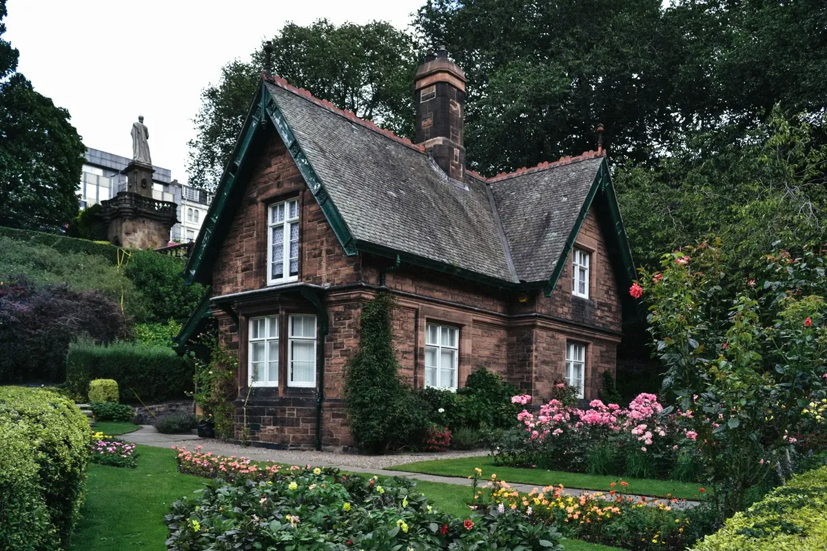 The Coach House, a Victorian stone lodge in a garden