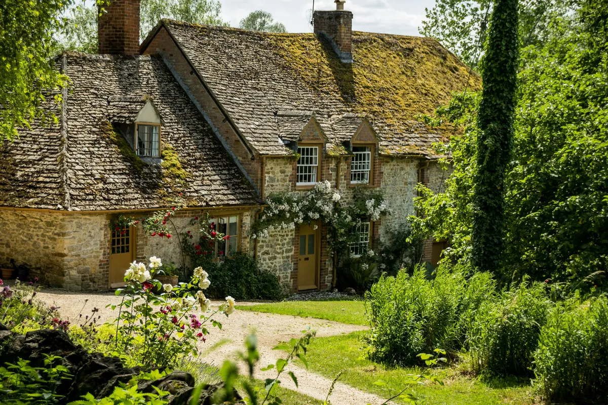 The Maltings, a stone farmhouse with a mossy roof