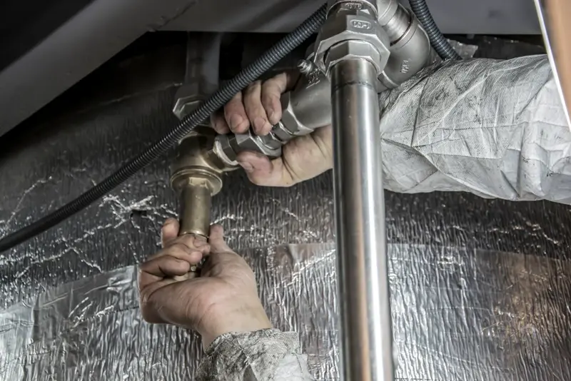 Tightening pipework joints in a tight space under the floor